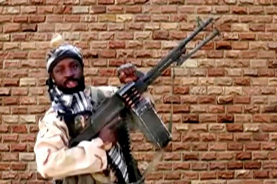 Boko Haram leader Abubakar Shekau holds a weapon in an unknown location in Nigeria in this still image taken from an undated video obtained on Jan 15, 2018 - Reuters photo