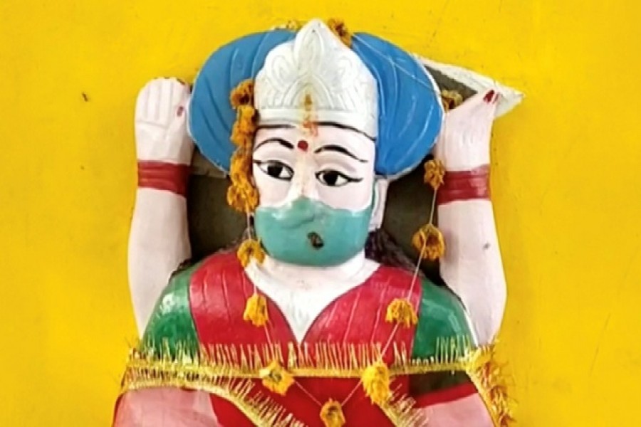 An idol of 'Corona Mata' (Mother Corona) is seen at a temple in Pratapgarh, amid the coronavirus disease (COVID-19) pandemic, Uttar Pradesh, India June 11, 2021, in this still image taken from video. REUTERS