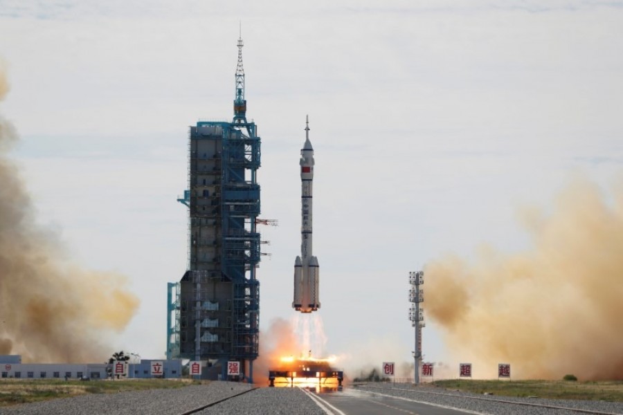 The Long March-2F Y12 rocket, carrying the Shenzhou-12 spacecraft and three astronauts, takes off from Jiuquan Satellite Launch Centre for China's first manned mission to build its space station, near Jiuquan, Gansu province, China on June 17, 2021 — Reuters photo