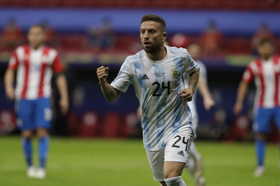 Argentina's Alejandro Gomez celebrates scoring the opening goal against Paraguay during a Copa America soccer match at the National stadium in Brasilia, Brazil, Monday, June 21, 2021. (AP Photo/Eraldo Peres)