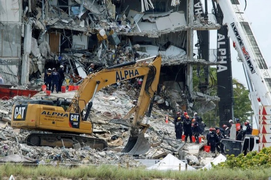 Emergency workers conduct search and rescue efforts at the site of a partially collapsed residential building in Surfside, near Miami Beach, Florida on June 28, 2021 — Reuters photo