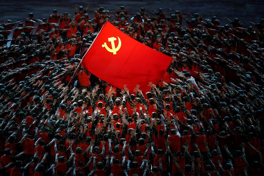 Performers rally around the Red Flag during a show commemorating the 100th anniversary of the founding of the Communist Party of China at the National Stadium in Beijing, China on June 28, 2021 — Reuters photo