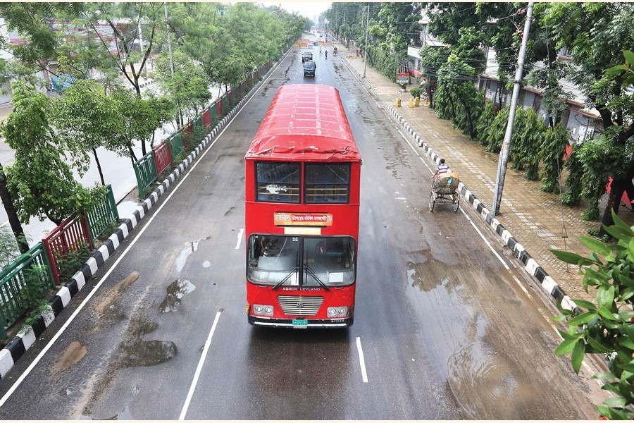 Dhaka city wears a deserted look on Friday - the second day of the weeklong nationwide strict restrictions on people's movement to stem the spread of coronavirus. The photo was taken in the Tejgaon area — FE photo by KAZ Sumon