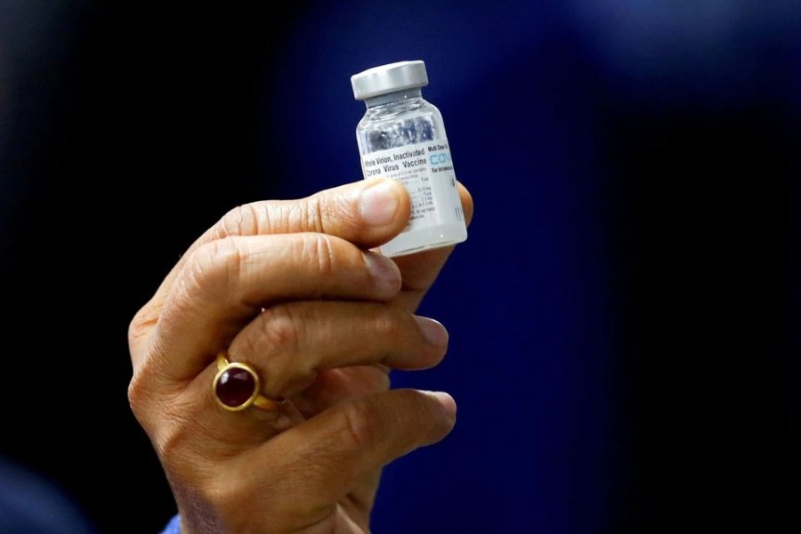 Indian Health Minister Harsh Vardhan holds a dose of Bharat Biotech's Covid-19 vaccine called COVAXIN, during a vaccination campaign at All India Institute of Medical Sciences (AIIMS) hospital in New Delhi, India on January 16, 2021 — Reuters/Files