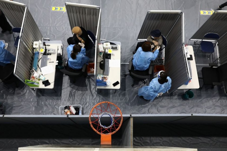 South Korean senior citizens receive their first dose of the Pfizer-BioNTech coronavirus disease (Covid-19) vaccine at a vaccination centre in Seoul, South Korea on April 1, 2021 — Pool via Reuters/Files