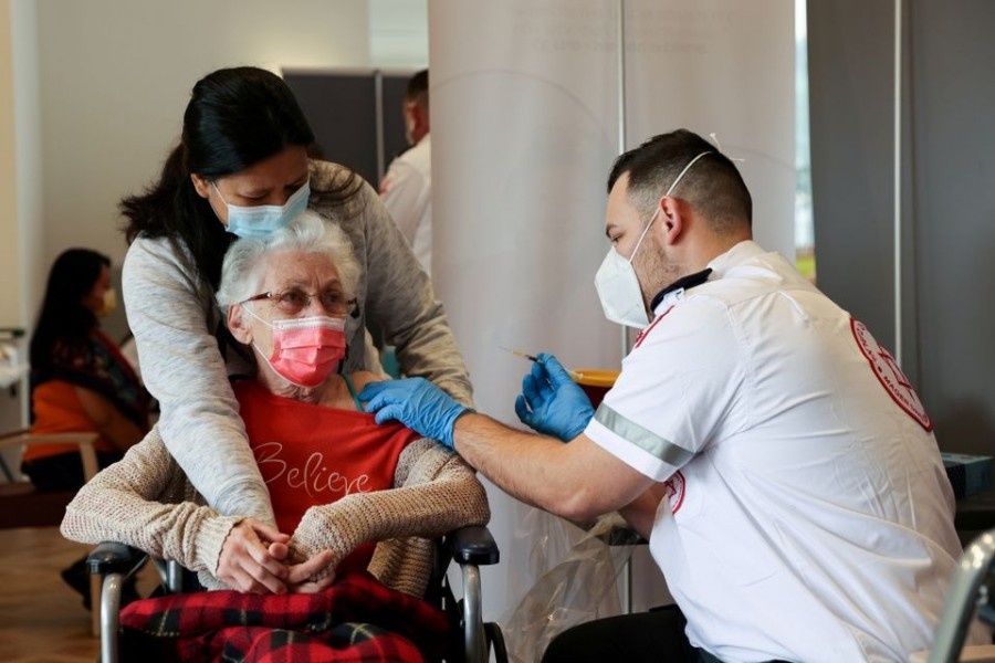 An elderly woman receives a booster shot of her vaccination against the coronavirus disease (Covid-19) at an assisted living facility, in Netanya, Israel on January 19, 2021 — Reuters/Files