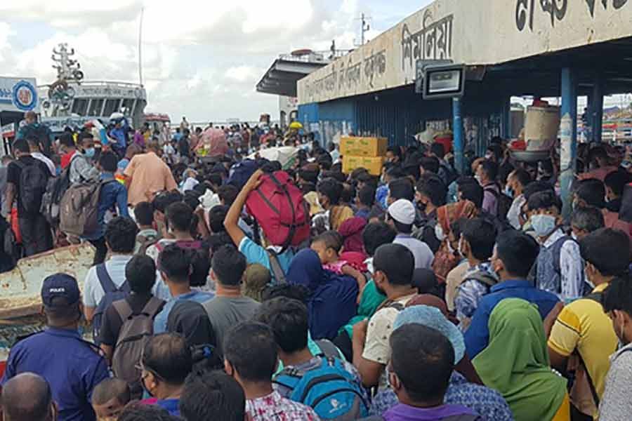 Thousands of homebound travellers crowd Shimulia ferry terminal