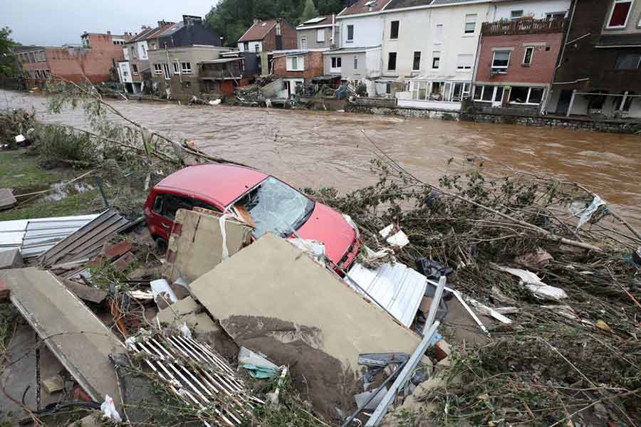 A damaged vehicle is seen next to the river on Friday in Pepinster of Belgium following heavy rainfalls -Reuters photo