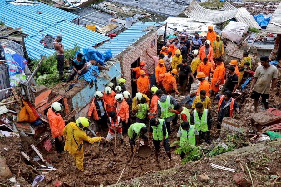 Rescue workers search for survivors after a residential house collapsed due to landslide caused by heavy rainfall in Mumbai, India on July 18, 2021 — Reuters photo