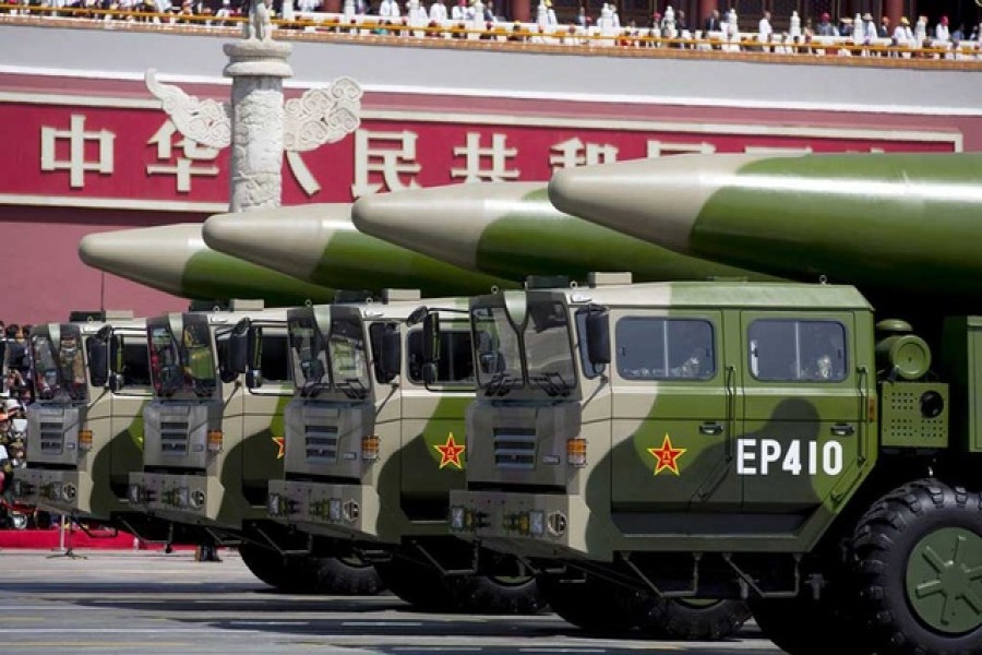 Military vehicles carrying DF-26 ballistic missiles travel past Tiananmen Gate during a military parade to commemorate the 70th anniversary of the end of World War II in Beijing, Thursday, Sept 3, 2015 — Reuters/Files