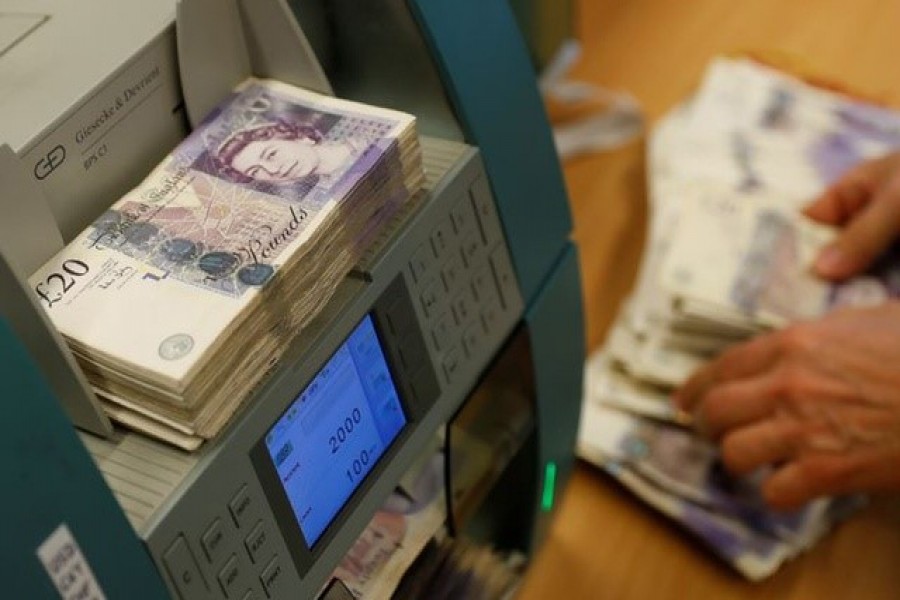 British Pound Sterling banknotes are seen in a counter machine at the Money Service Austria company's headquarters in Vienna, Austria, November 16, 2017 — Reuters/Files