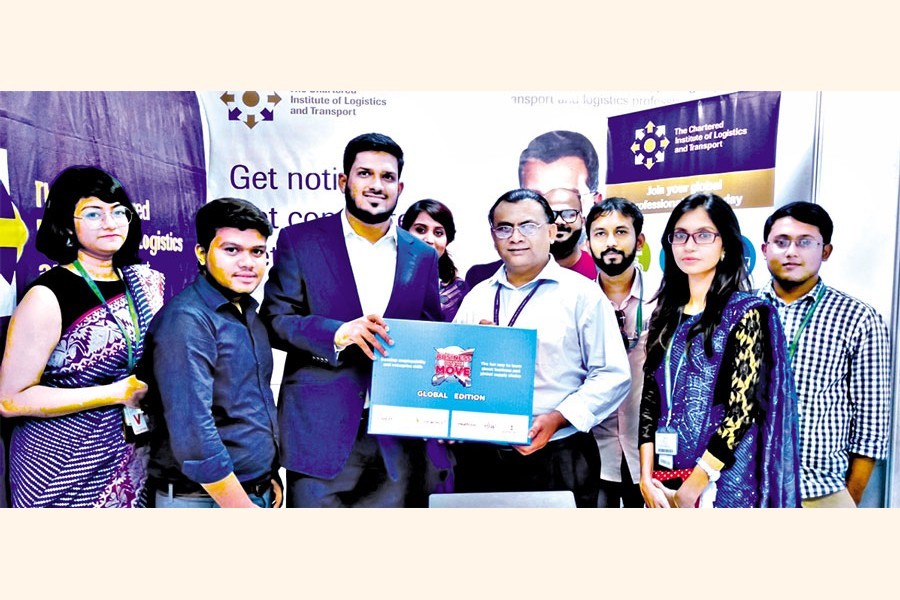 Tanjil Ahmed Ruhullah presenting the CILT "Business on the Move" board game to the students of the OSCM department of American International University Bangladesh in their job fair