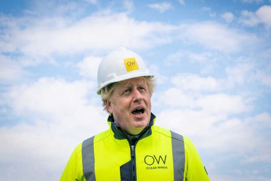 British Prime Minister Boris Johnson reacts onboard the Esvagt Alba during a visit to the Moray Offshore Windfarm East, off the Scottish Aberdeenshire coast, Aug 5, 2021 — Reuters