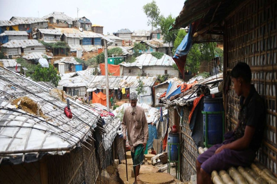 A Rohingya refugee walks at a refugee camp in Coxs Bazar, Bangladesh - Reuters photo