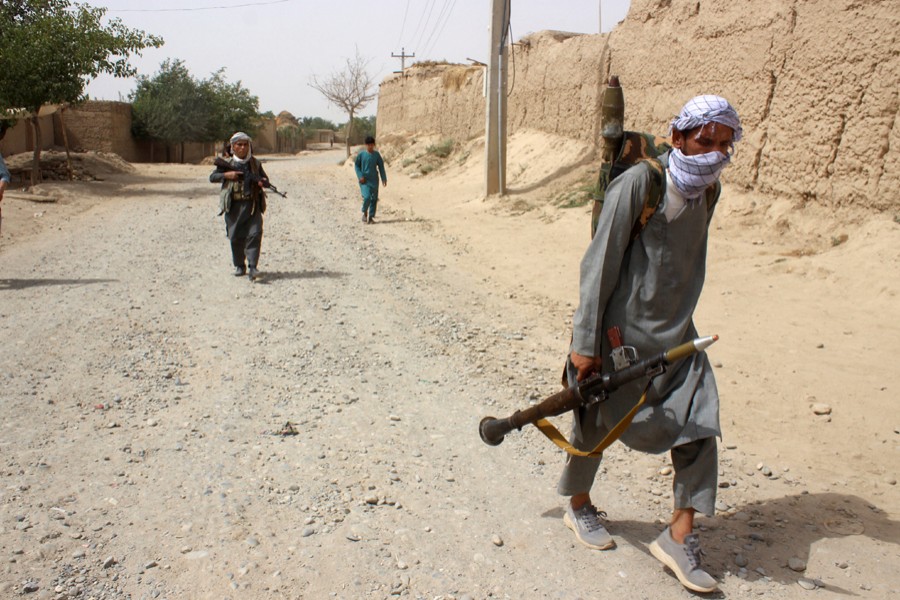 Taliban fighters stand guard at a check point in Farah, Afghanistan on August 11, 2021 — Reuters photo