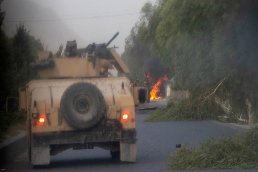 Humvees that belong to Afghan Special Forces are seen destroyed during heavy clashes with Taliban during the rescue mission of a police officer besieged at a check post, in Kandahar province, Afghanistan, Jul 13, 2021 — Reuters/Files