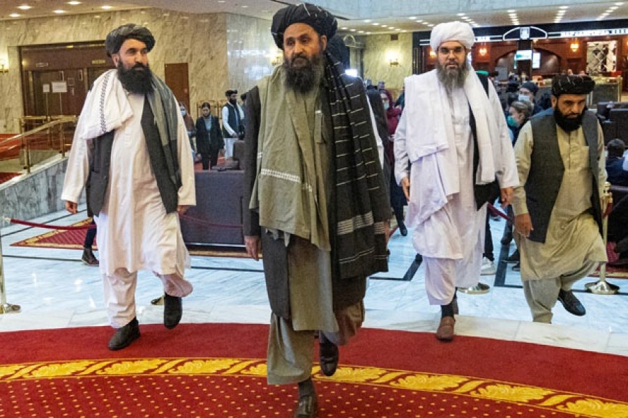 FILE PHOTO: Mullah Abdul Ghani Baradar, the Taliban's deputy leader and negotiator, and other delegation members attend the Afghan peace conference in Moscow, Russia March 18, 2021. Alexander Zemlianichenko/Pool via REUTERS/File Photo