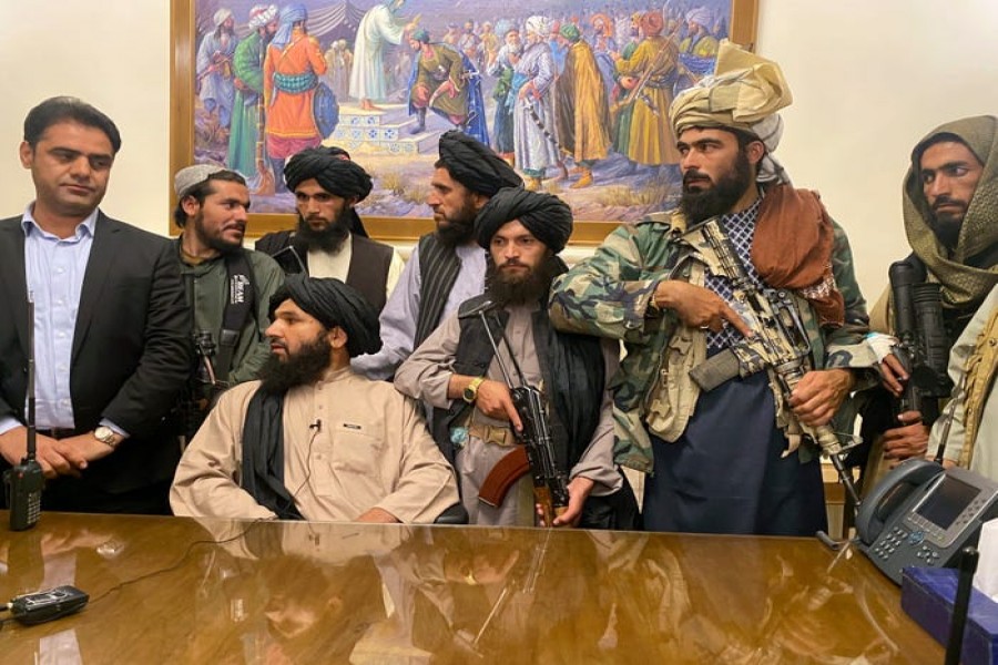 Taliban fighters take control of Afghan presidential palace after the Afghan President Ashraf Ghani fled the country, in Kabul, Afghanistan, Sunday, Aug. 15, 2021. (Photo | AP)