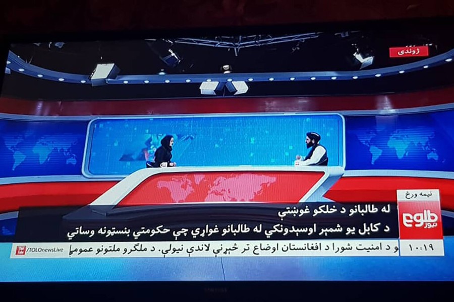 Beheshta Arghand interviewing Taliban spokesperson Mawlawi Abdulhaq Hemad on Tolo News on Tuesday. Courtesy:  Tolo News