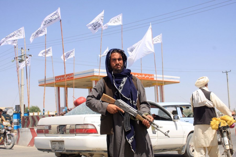 A Taliban fighter looks on as he stands at the city of Ghazni, Afghanistan August 14, 2021. REUTERS/Stringer