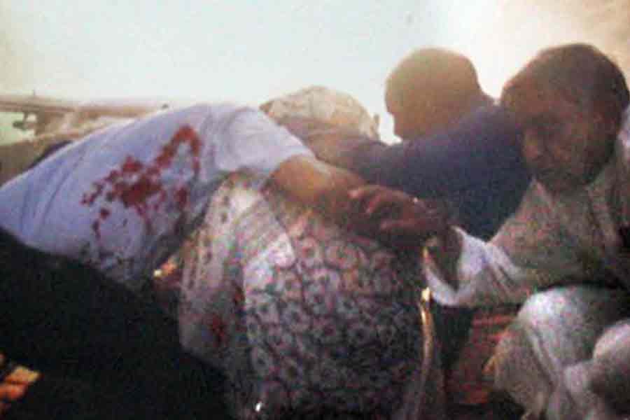 Awami League leaders and activists created a human shield risking their lives and saved the incumbent Prime Minister Sheikh Hasina from gruesome grenade attacks at Bangabandhu Avenue in the capital on August 21 in 2004. -Focus Bangla file photo