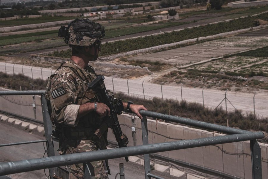 A soldier assigned to the 82nd Airborne Division provides security at Hamid Karzai International Airport, Afghanistan on August 21, 2021 — US Marine Corps Handout via REUTERS