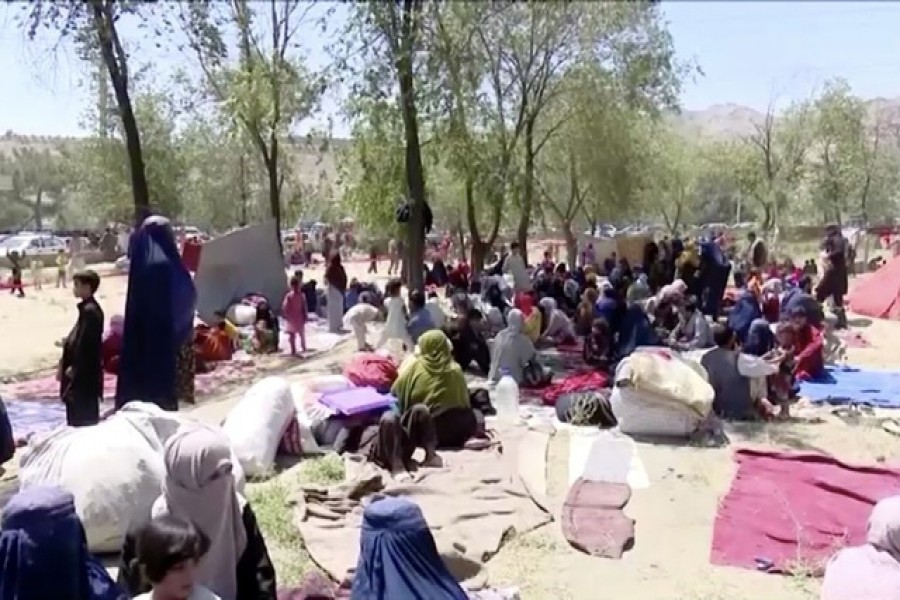 Families displaced by fighting sit in a park in Kabul, Afghanistan, August 26, 2021. REUTERS/Reuters TV