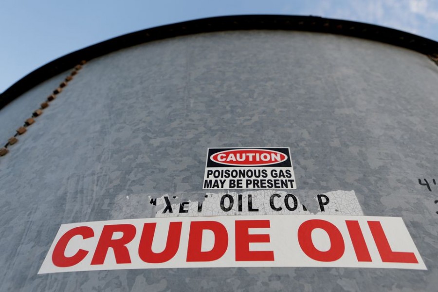 A sticker reads crude oil on the side of a storage tank in the Permian Basin in Mentone, Loving County, Texas, US, November 22, 2019. REUTERS/Angus Mordant