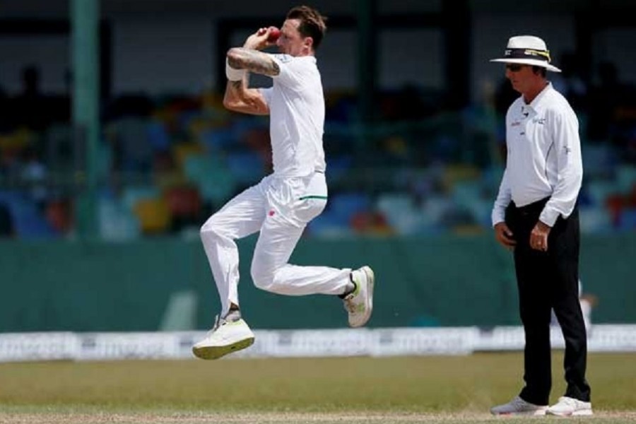 Cricket - Sri Lanka v South Africa -Second Test Match - Colombo, Sri Lanka - July 22, 2018 - South Africa's Dale Steyn (L) bowls next to umpire Rod Tucker. REUTERS/Dinuka Liyanawatte/File Photo