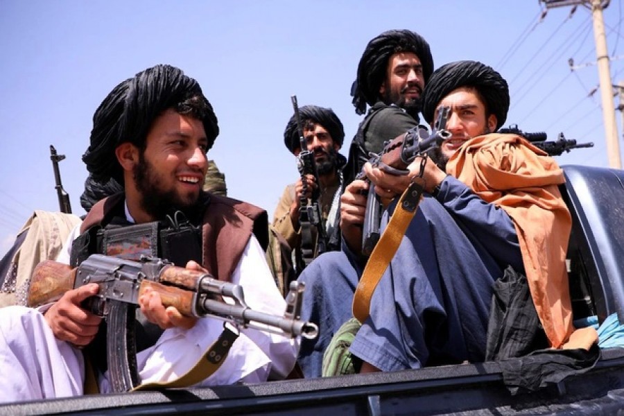 Taliban forces patrol in front of Hamid Karzai International Airport in Kabul, Afghanistan, Sept 2, 2021. REUTERS