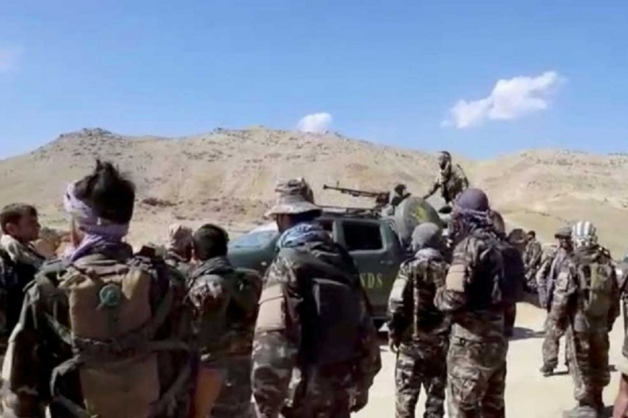 A truck with National Resistance Front markings is seen on a mountain top near Panjshir Valley, Afghanistan in this still image obtained from an undated video handout. Handout via REUTERS