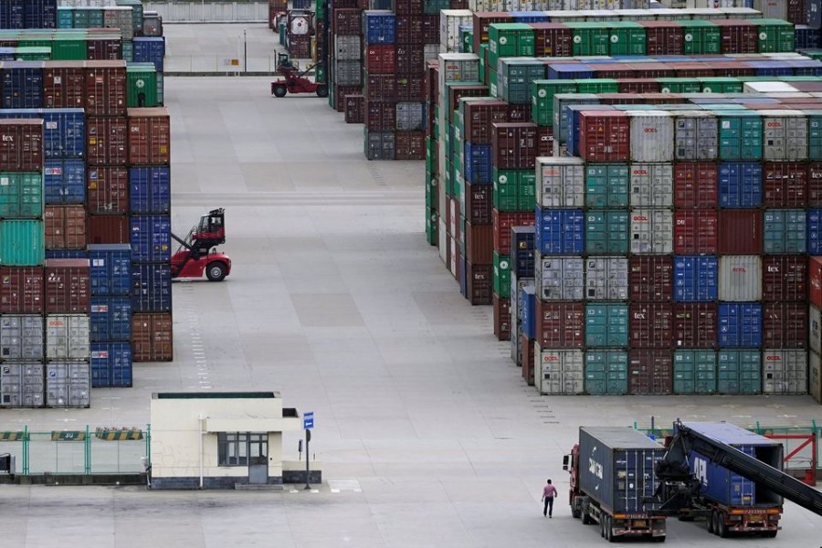 Containers are seen at the Yangshan Deep-Water Port in Shanghai, China October 19, 2020. REUTERS/Aly Song