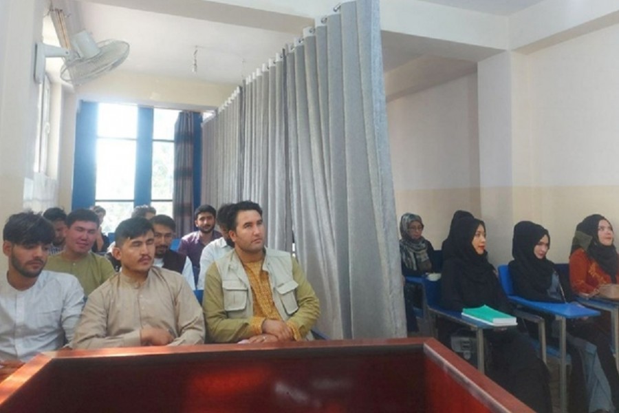 Students attend class under new classroom conditions at Avicenna University in Kabul, Afghanistan September 6, 2021, in this picture obtained by REUTERS from social media. Social media handout/via REUTERS