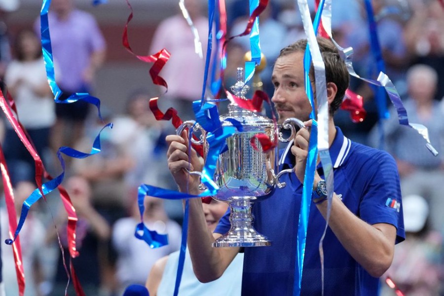 Daniil Medvedev of Russia celebrates with the championship trophy after his match against Novak Djokovic of Serbia (not pictured) in the men's singles final on day fourteen of the 2021 US Open tennis tournament at USTA Billie Jean King National Tennis Center — USA TODAY Sports via Reuters