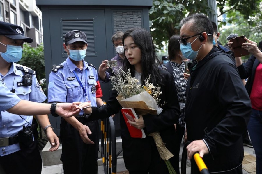 Zhou Xiaoxuan, also known by her online name Xianzi, arrives at a court for a sexual harassment case involving a Chinese state TV host, in Beijing, China on September 14, 2021 — Reuters photo