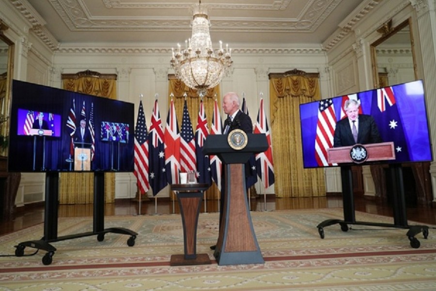 US President Joe Biden delivers remarks on a National Security Initiative virtually with Australian Prime Minister Scott Morrison and British Prime Minister Boris Johnson, inside the East Room at the White House in Washington, US, September 15, 2021. REUTERS/Tom Brenner