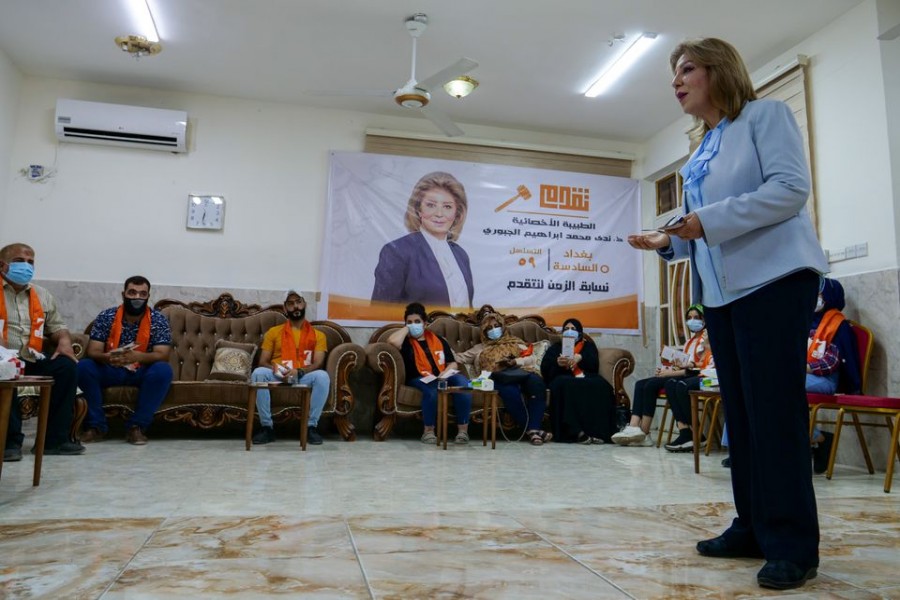 Nada al-Jubori, a candidate in Iraq's upcoming parliamentary elections, speaks to her supporters in Baghdad, Iraq September 9, 2021 — Reuters