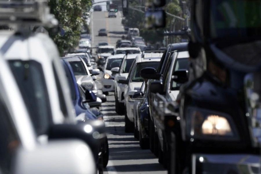 Heavy vehicular traffic is seen in the Ocean Beach neighbourhood of San Diego, California, U.S., ahead of the Fourth of July holiday July 3, 2020. REUTERS/Bing Guan