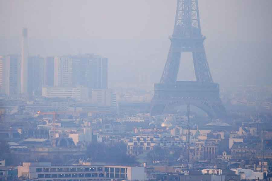 The Eiffel Tower is surrounded by a small-particle haze which hangs above the skyline in France on December 9 in 2016 –Reuters file photo