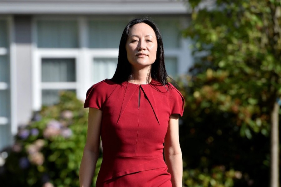 Huawei Technologies Chief Financial Officer Meng Wanzhou leaves her home to attend a court hearing in Vancouver, Canada, August 10, 2021. REUTERS/Jennifer Gauthier