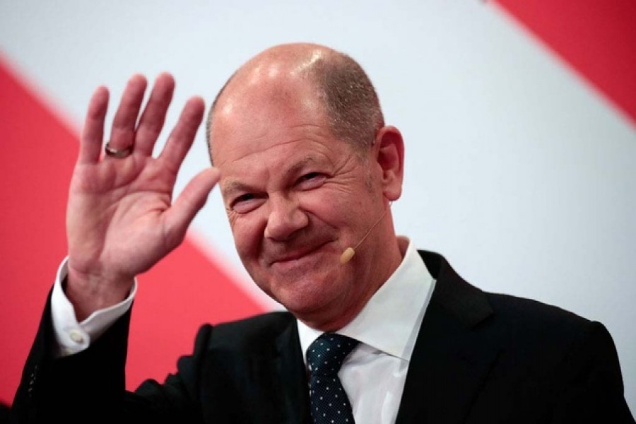 Social Democratic Party (SPD) leader and top candidate for chancellor Olaf Scholz reacts after first exit polls for the general elections in Berlin, Germany, September 26, 2021 -- Reuters