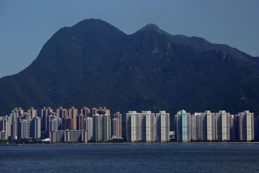 Residential apartments are seen under Ma On Shan peak in Hong Kong, China August 29, 2017. Picture taken August 29, 2017. REUTERS/Bobby Yip/File Photo