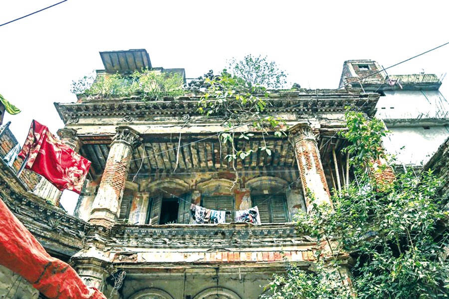 The plaster has fallen off several parts of the old building in old Dhaka due to the lack of preservation and restoration efforts     —bdnews24.com