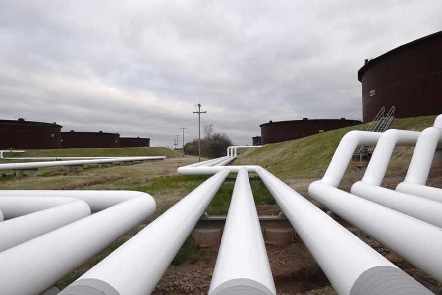 Pipelines running to Enbridge Inc.'s crude oil storage tanks at their tank farm in Cushing of Oklahoma on March 24 in 2016 –Reuters file photo