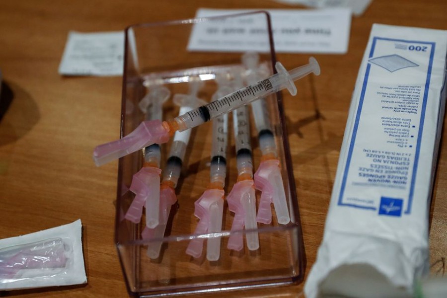 Syringes filled with a dose of the Moderna Covid-19 vaccine sit on a table during an employee vaccination at the Sarasota Memorial Hospital in Sarasota, Florida, US on September 24, 2021 — Reuters/Files