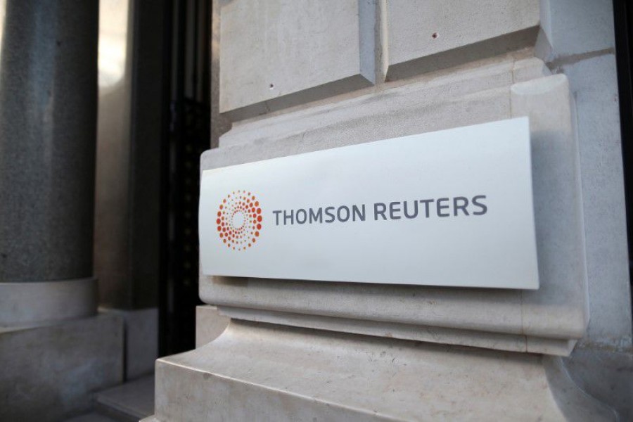 The logo of Thomson Reuters is pictured at the entrance of its Paris headquarters, France, March 7, 2016. REUTERS/Charles Platiau/File Photo