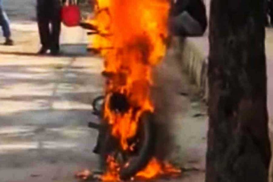 Another ride-sharing biker sets motorcycle on fire