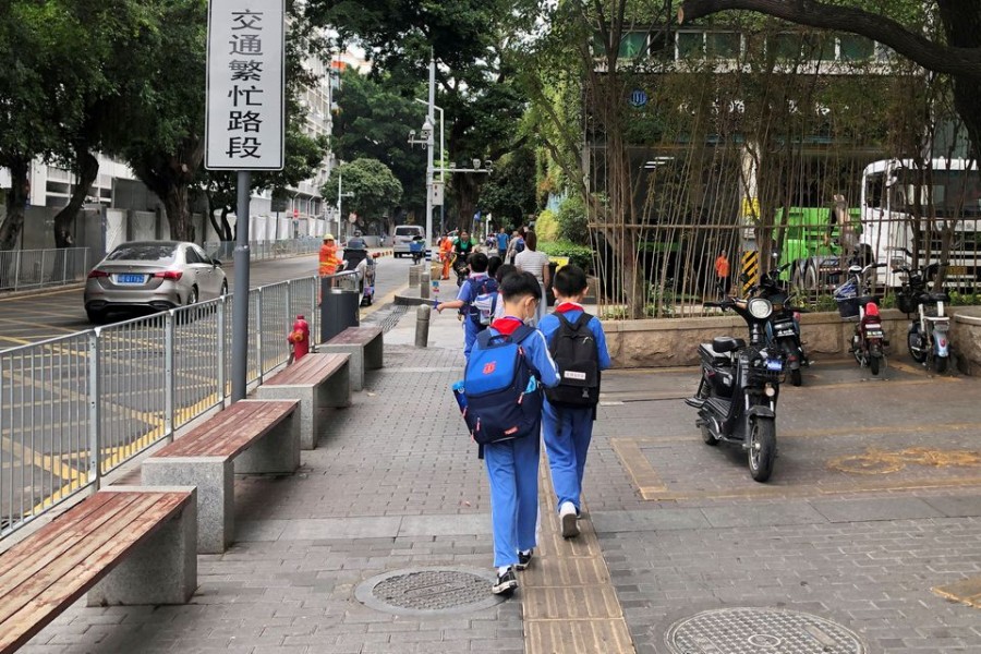 Children leave a school in Shekou area of Shenzhen, Guangdong province, China on April 20, 2021 — Reuters/Files