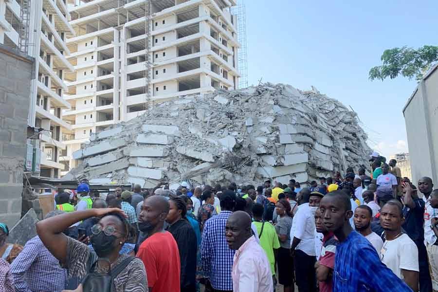 People gathering at the site of a collapsed 21-story building in Lagos of Nigeria on November 1 –Reuters file photo