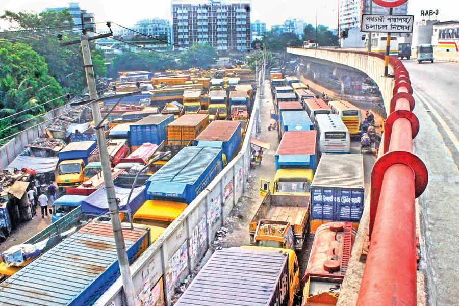 Lorries and covered vans remained parked on roads at Sayedabad in the city during a strike in 2018. –FE file photo